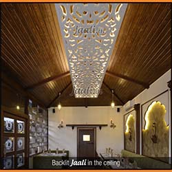 Ethnique backlit Jaali in the ceiling with chamfered edges made out of 18mm thick MDF installed in a restaurant enhancing its ambiance copy